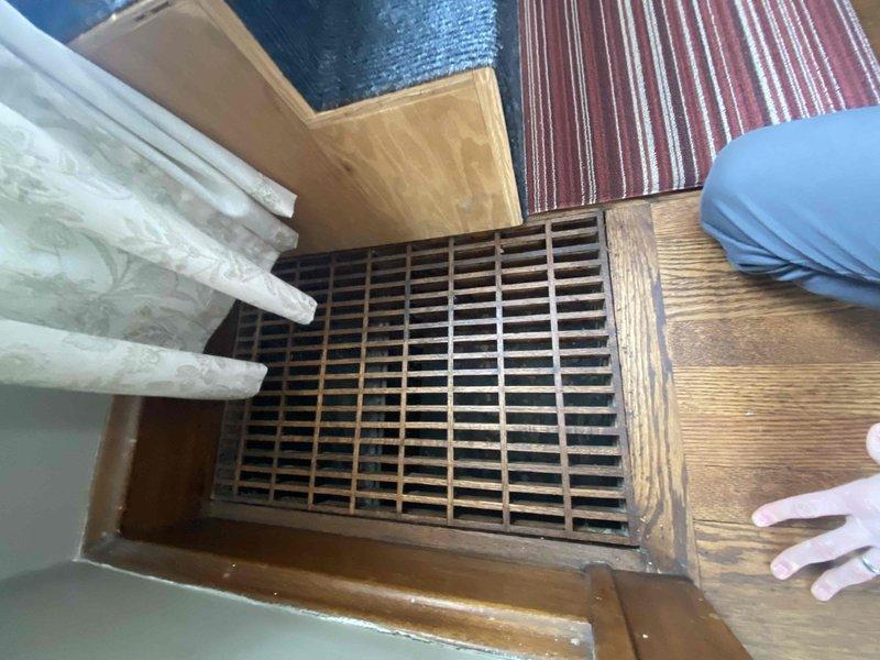 Conducted evaluation of existing HVAC system following client referral from Jeff. Inspection revealed aging unit in mechanical room with PVC drain system and insulated ductwork. Assessed floor register condition and airflow delivery throughout home for potential full system replacement.