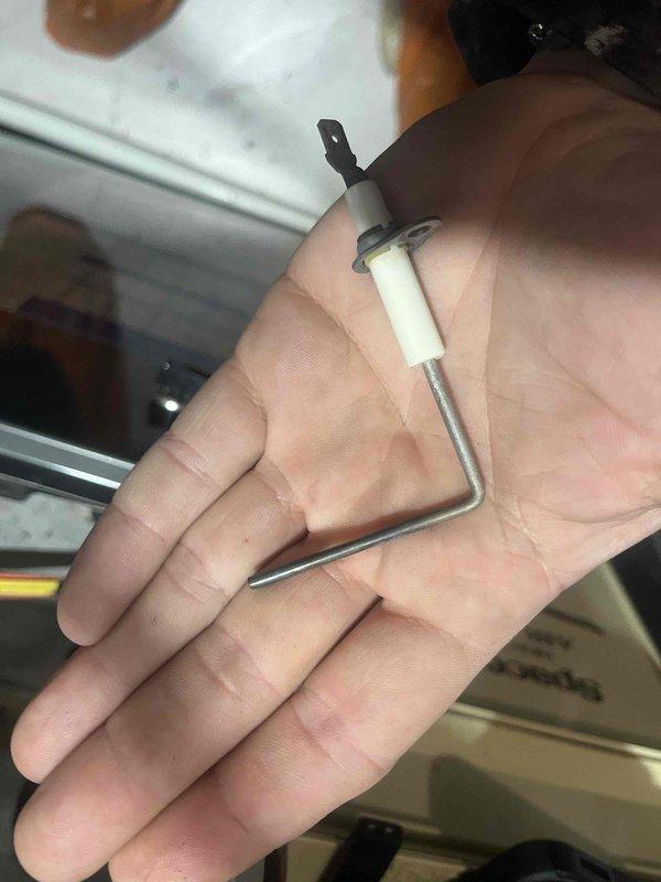 Performed diagnostic inspection on unit that was reportedly cycling on/off more frequently than normal. Removed and inspected flame sensor which showed signs of corrosion. Replaced flame sensor assembly and verified proper ignition sequence. System now operating within normal parameters.