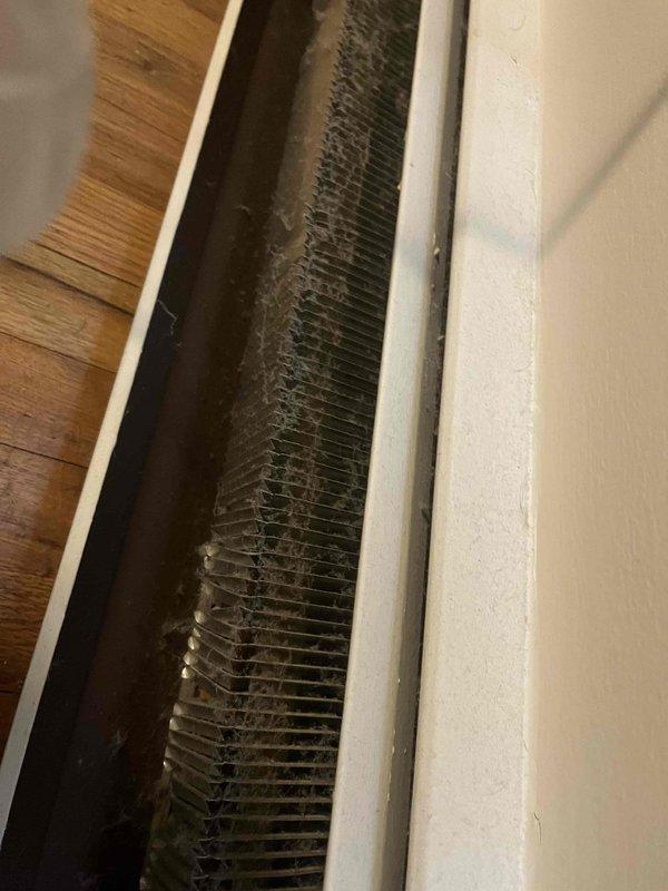 Responded to service call for boiler temperature inconsistency where system was set at 68°F but dropped to 64°F overnight. Inspection revealed significant dust accumulation in baseboards and heating vents, restricting proper heat distribution. Performed thorough cleaning of heat exchanger fins and air filters to restore optimal system performance.
