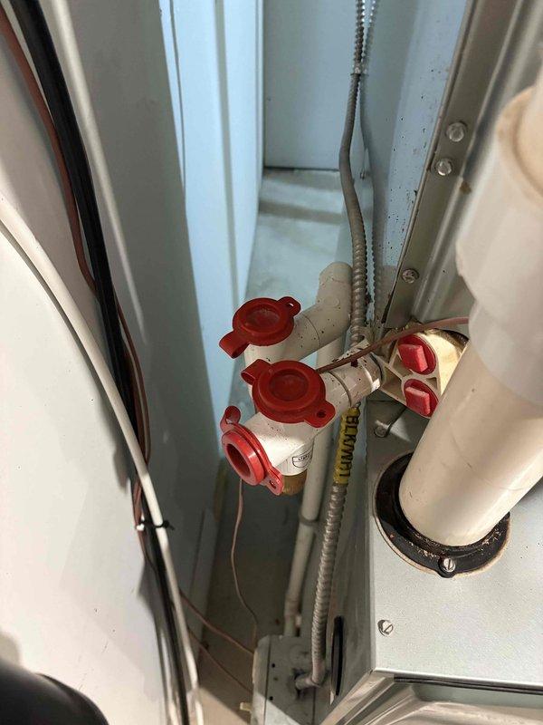 Performed assessment of existing HVAC system including aging furnace (recently repaired) and AC unit. Inspected electrical control panel with functioning circuit board and verified proper wiring connections. Evaluated plumbing components in utility space, noting water heater replacement requirement as requested by customer. Customer also interested in replacing water heater as part of system upgrade.