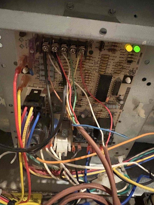 Performed assessment of existing HVAC system including aging furnace (recently repaired) and AC unit. Inspected electrical control panel with functioning circuit board and verified proper wiring connections. Evaluated plumbing components in utility space, noting water heater replacement requirement as requested by customer. Customer also interested in replacing water heater as part of system upgrade.