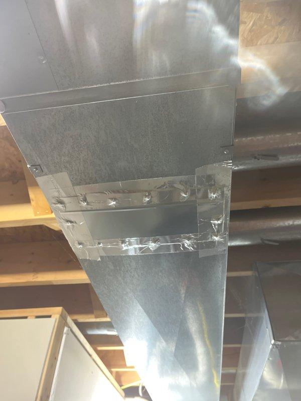 Completed follow-up furnace installation originally sold by Greg and reassigned by Jeff. Installed new galvanized sheet metal ductwork with proper sealing at connection points using metallic foil tape. System tested with temperature probe confirming proper heat output at 320 degrees.
