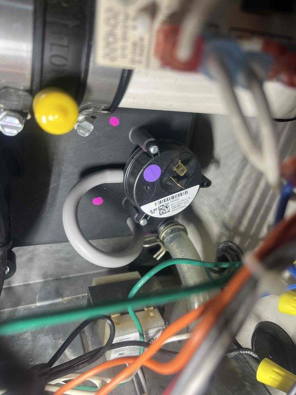 Performed diagnostic on system that was not activating despite temperature differential. Identified faulty pressure switch as the source of the issue. Replaced electrical connection at pressure switch and inspected wiring harness. System now functioning properly with normal operation restored.