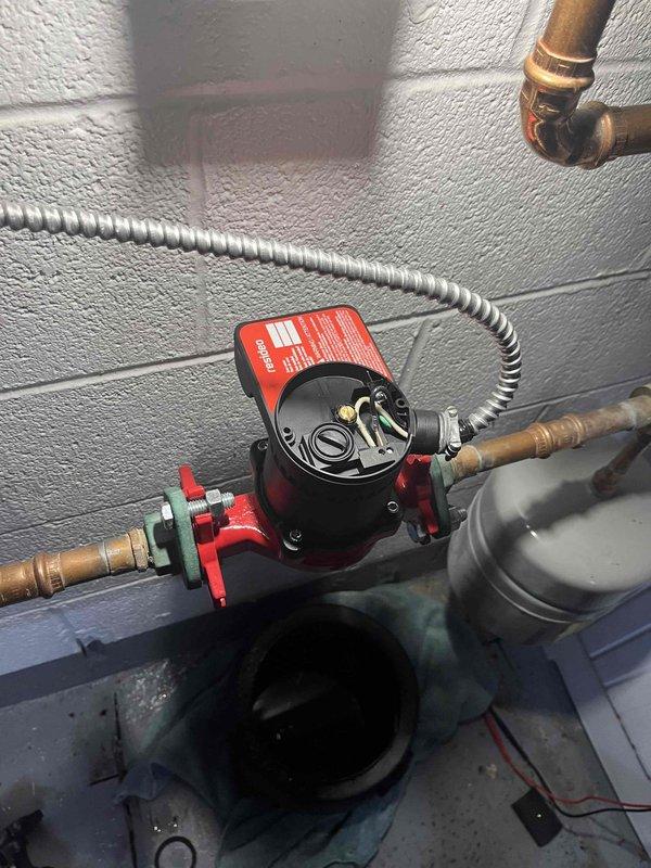 Replaced failed circulation pump on 3-5 year old tankless hot water baseboard heating system. Pump had been leaking from the bottom seal. Installed new Taco circulator and verified proper operation of the system.
