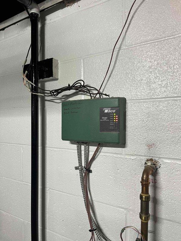 Replaced failed circulation pump on 3-5 year old tankless hot water baseboard heating system. Pump had been leaking from the bottom seal. Installed new Taco circulator and verified proper operation of the system.