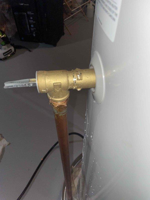 Completed membership plumbing maintenance visit to address reported gurgling sound from sink when toilets flush. Inspected drain system and found significant buildup of residue and debris causing restricted flow. Also identified minor leak at copper pipe connection to water heater with visible moisture on appliance panel. Cleared drain blockage and tightened/repaired water heater fitting connection to resolve both issues.