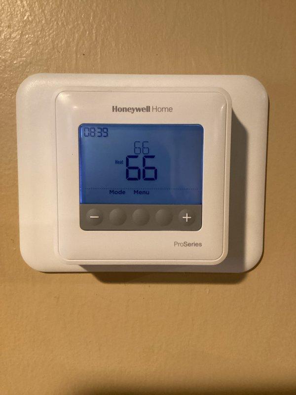 Performed scheduled KB-Boiler Only Maintenance Member Visit. Inspected boiler system components including expansion tank, copper piping, and brass valve assemblies - all found in proper working condition with no leaks or corrosion. Verified Honeywell Home ProSeries thermostat operation, confirming proper heat mode functionality with system maintaining set temperature of 66°F.