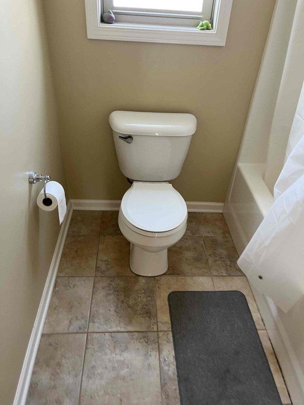 Conducted site assessment for toilet replacement at expired club member's location. Inspected existing standard height toilets throughout the facility and documented current bathroom configuration. Evaluated tankless water heater system to ensure adequate capacity for proposed fixture replacements. Discussed ADA height toilet options with client as potential replacements for standard units.
