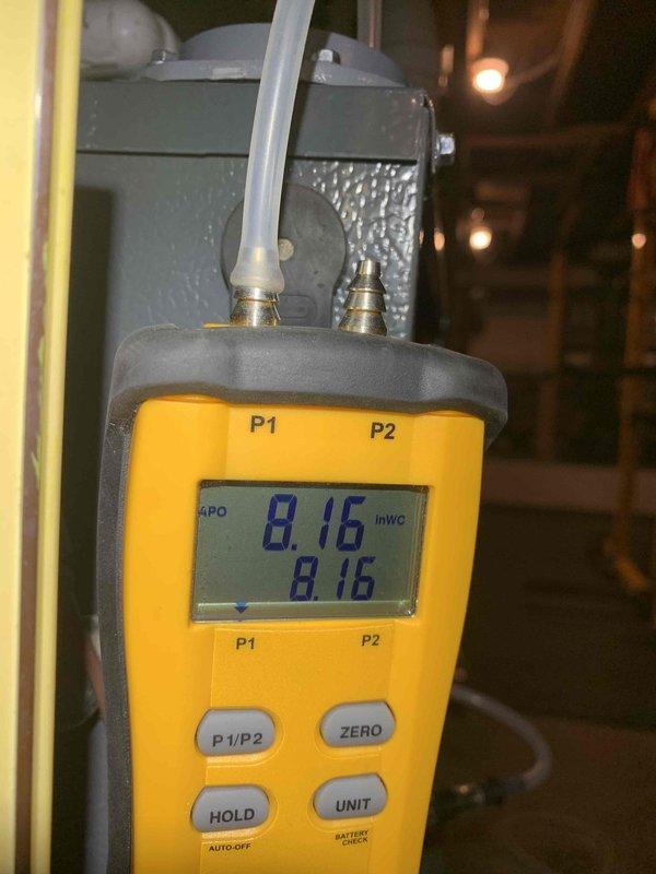 Diagnosed propane furnace experiencing delayed ignition with loud bang on startup. Performed internal component inspection of the 65,000 BTU air handler system. Conducted pressure testing with digital manometer, confirming gas pressure readings at 8.16 inWC on both inlet and outlet, which falls within manufacturer specifications.