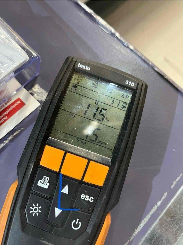 Completed follow-up furnace installation initially sold by Jon and flipped by Jeffdz. Installed galvanized metal ductwork system in basement/utility area and performed combustion analysis using Testo 310, confirming proper CO levels at 5 ppm and 1.5% combustion efficiency. All systems functioning within specifications.