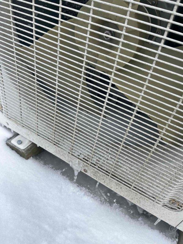 Responded to service call for heat pump not producing heat. Inspection revealed significant ice and frost accumulation on outdoor condensing unit, indicating restricted airflow and improper defrost cycle operation. Performed defrost cycle testing and cleared ice buildup to restore proper system function.