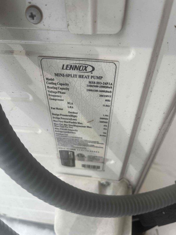 Conducted assessment of existing Lennox mini-split heat pump system (model HSB-HO-24P1A) for potential replacement. Documented current installation showing wall-mounted indoor air handler and external heat pump unit with visible wear. Noted specifications for proper sizing of replacement system. Contacted customer (Elaine Parks) regarding scheduling follow-up for complete system replacement.