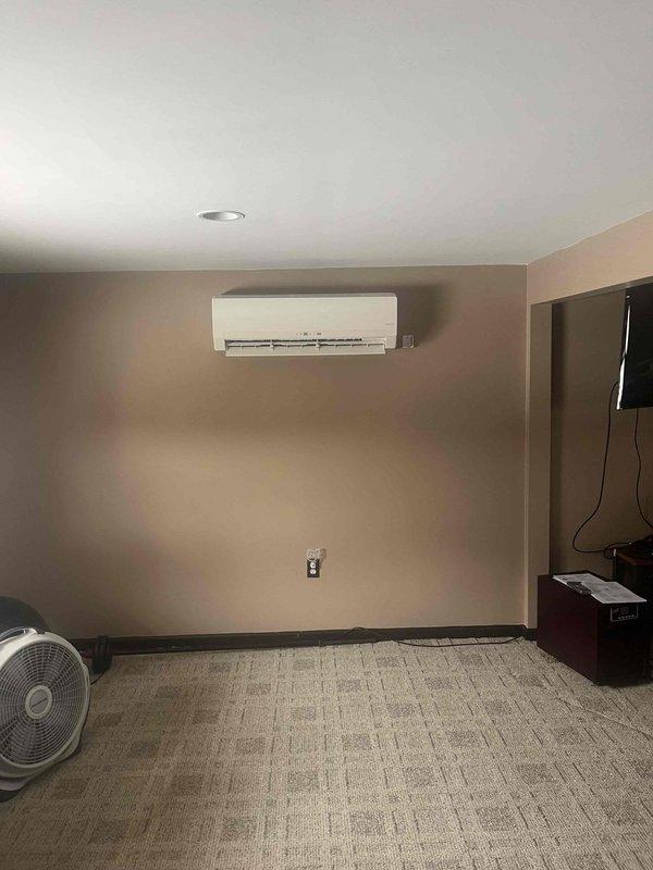 Conducted assessment of existing Lennox mini-split heat pump system (model HSB-HO-24P1A) for potential replacement. Documented current installation showing wall-mounted indoor air handler and external heat pump unit with visible wear. Noted specifications for proper sizing of replacement system. Contacted customer (Elaine Parks) regarding scheduling follow-up for complete system replacement.
