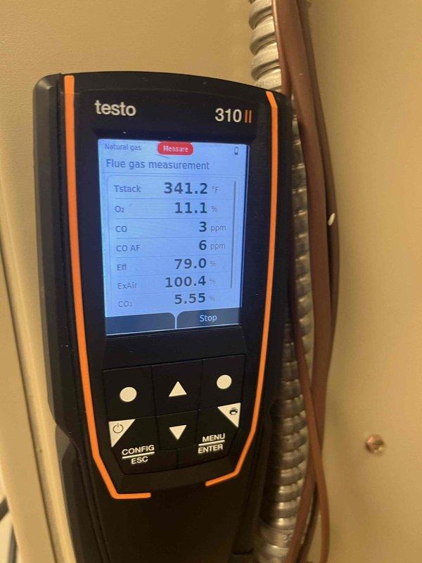 Performed diagnostic testing on aging humidifier-dehumidifier system using Testo 310 II analyzer, which revealed stack temperature of 341.2°F with 79.0% efficiency and 3ppm CO levels. Inspected ignition electrode component and determined both the humidifier requires replacement and furnace needs further evaluation due to suboptimal performance.