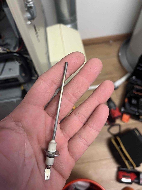 Performed diagnostic testing on aging humidifier-dehumidifier system using Testo 310 II analyzer, which revealed stack temperature of 341.2°F with 79.0% efficiency and 3ppm CO levels. Inspected ignition electrode component and determined both the humidifier requires replacement and furnace needs further evaluation due to suboptimal performance.