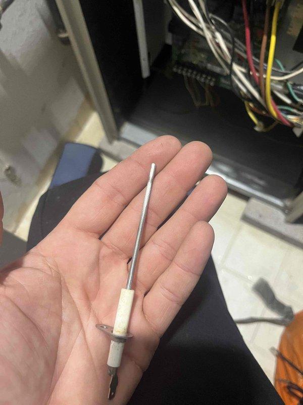 Diagnosed intermittent operation issue on guest house gas furnace. Inspected flame sensor and control board (White-Rodgers/Lennox SureLight module), confirmed proper function of LED indicator. Cleaned flame sensor to restore reliable ignition sequence and normal operation.