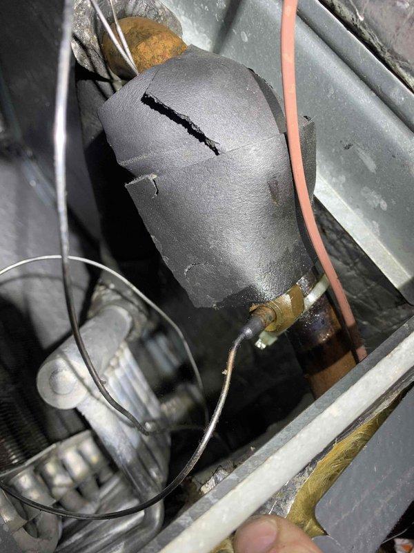 Responded to emergency service call for Mary Beth O'Malley reporting loud explosion from furnace room. Inspection revealed complete separation of the refrigerant line connecting heat pump to furnace, with significant cracking in the insulation and visible damage to the pipe. Evaluated control board and wiring connections which remained intact despite the incident.
