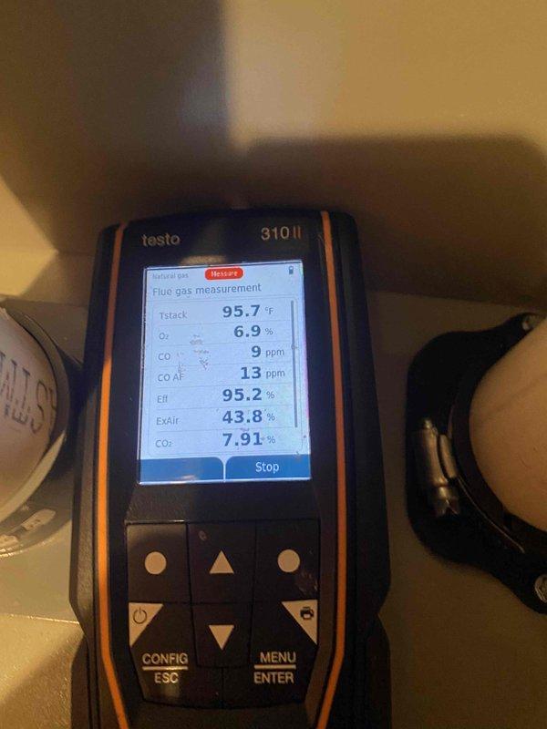 Completed installation of American Standard 96% 80K BTU 2-stage furnace with additional cold air return ducting. Final combustion analysis performed with Testo 310 II analyzer showing excellent system efficiency at 95.2% with CO levels within safe parameters (9 ppm) and proper air/fuel ratio (43.8% excess air).