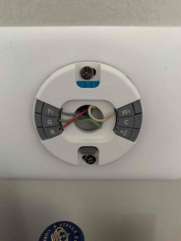 Diagnosed no heat issue in system less than 10 years old. Inspected thermostat wiring connections and verified proper installation of R, W1, G, Y1, and C wires. Tested voltage with Fieldpiece SC490 meter, confirming 168V power supply to unit. System remains non-operational despite verification of electrical components; recommended further diagnosis of control board or gas valve.