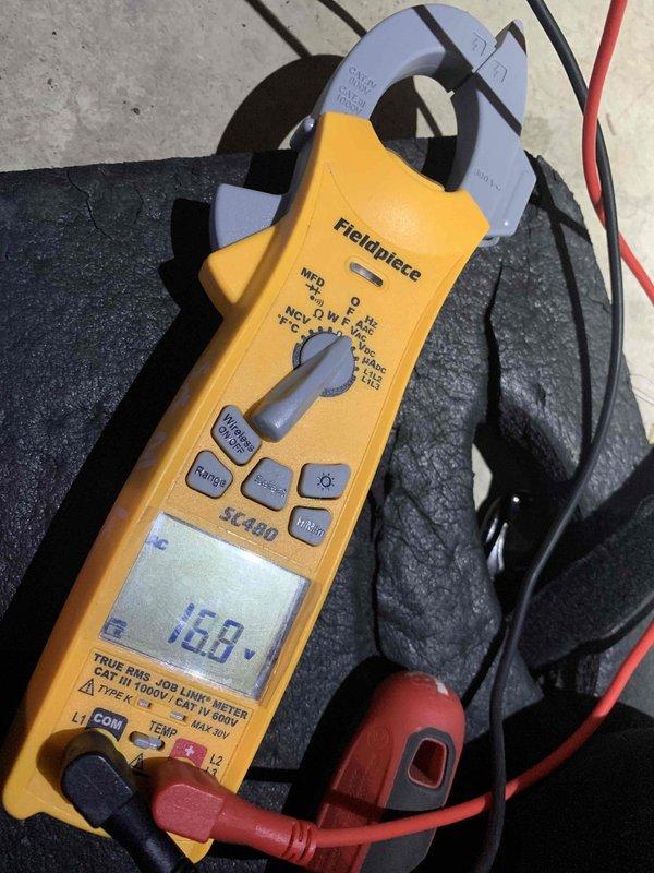 Diagnosed no heat issue in system less than 10 years old. Inspected thermostat wiring connections and verified proper installation of R, W1, G, Y1, and C wires. Tested voltage with Fieldpiece SC490 meter, confirming 168V power supply to unit. System remains non-operational despite verification of electrical components; recommended further diagnosis of control board or gas valve.