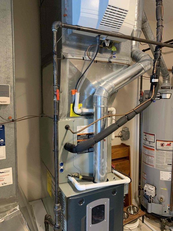 Replaced customer's humidifier water panel and filter during routine maintenance. Discovered water flow issues with supply tube (no water coming through). System currently set at 6% with 24% humidity reading. Customer expressed concerns about possible installation error; provided guidance on proper humidifier operation.