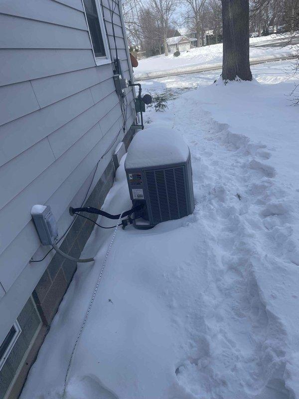 Returned to property to locate suspected broken pipe using camera equipment. Conducted exterior inspection in snowy conditions with measuring equipment to identify pipe location. Documentation photos were taken of the HVAC unit area and measurements where pipe damage is suspected.