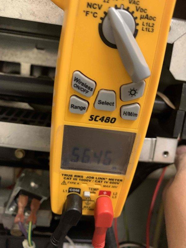 Performed routine maintenance on Carrier gas furnace including filter replacement. Conducted electrical diagnostic testing with multimeter showing 56.45V reading. Inspected and verified proper wiring connections to ensure system functionality and safety. System is operating within normal parameters.