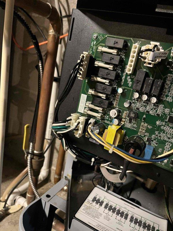 Completed warranty replacement of defective control board in HVAC system. Removed existing circuit board, installed new OEM replacement board, reconnected all control wiring harnesses, and verified proper system operation through testing. System now functioning as designed with no operational issues.