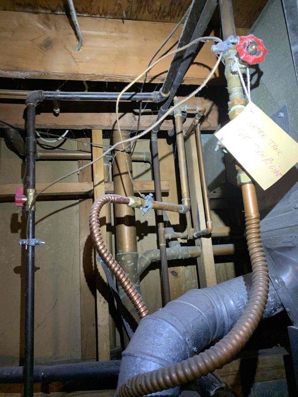 Responded to call regarding insufficient heating overnight where system was not maintaining temperature (65°F at air handler). Inspected furnace components and identified faulty flame sensor requiring cleaning/replacement. Also examined plumbing connections to heating system and verified proper operation after service. System now maintaining proper temperature.