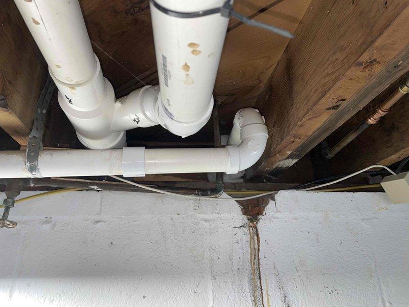 Cleared severe clog in dual kitchen sink after customer's unsuccessful attempts using chemical drain cleaners. Inspected basement plumbing infrastructure and identified buildup in drain line. Performed thorough mechanical clearing of the affected pipes, removing accumulated debris that was causing the blockage.