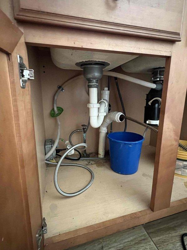 Successfully completed dishwasher reinstallation service sold by Sam F. Verified proper connections to existing plumbing system under sink cabinet, ensuring secure water supply lines and proper drainage. All connections were tested for leaks and proper function before completing the job.