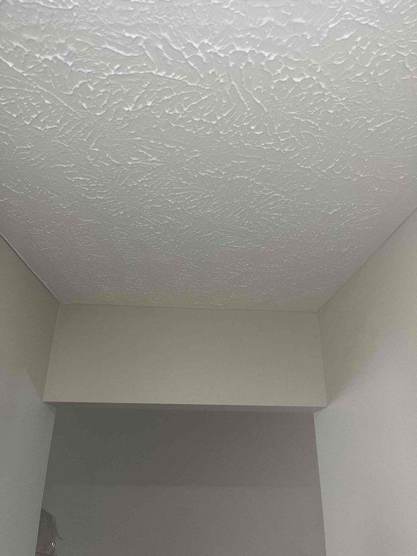 Responded to service call regarding water leak from ceiling near boiler closet. Inspection revealed moisture intrusion through textured ceiling. Upon accessing attic space, identified the source of the leak in the plumbing system. Repaired damaged pipe and verified system integrity. Confirmed no active leakage before departure.