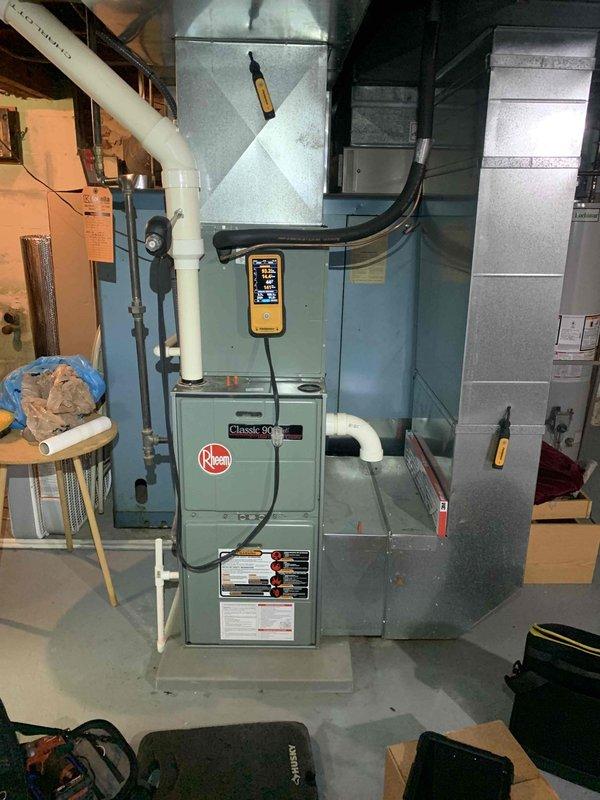 Returned to customer's residence to install previously sold repair items. Successfully replaced the inducer motor and blower capacitor on Rheem Classic 90 furnace. Performed electrical testing on the capacitor to verify proper operation. System is now functioning correctly with all components installed and operational.