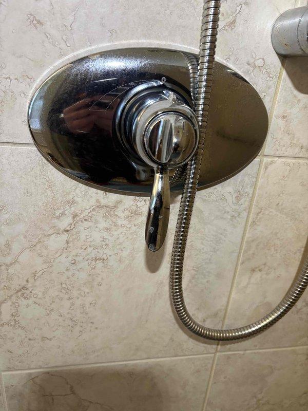 Successfully completed rebuilding of Hansgrohe shower valve by removing damaged shower stem and installing replacement parts. Restored proper functionality to the shower control fixture, ensuring proper water flow and temperature regulation through the single-handle faucet assembly.