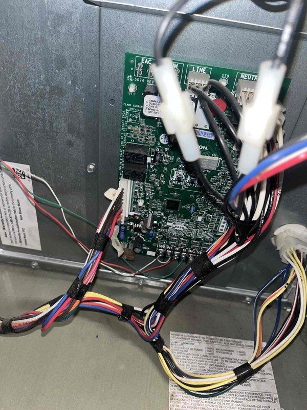 Completed warranty replacement of defective circuit board and motor in HVAC system. Removed existing components, installed new control board with proper wire connections to line/neutral terminals, and verified system operation after installation. All components now functioning correctly with proper electrical connections.