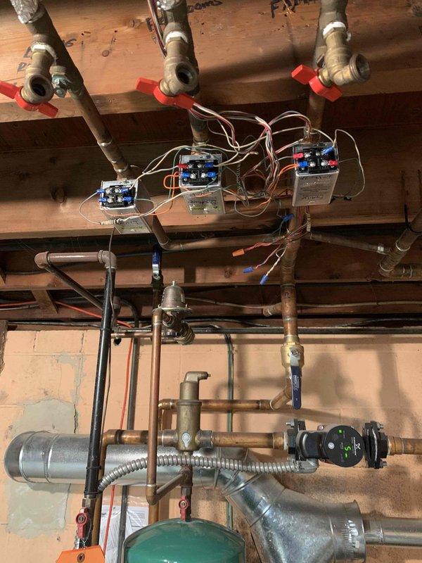 Completed second phase of zone valve repair by replacing two remaining zone valve power heads in customer's hydronic heating system. Installation included proper wiring of the new power heads to the existing control system and verification of proper operation. All work was performed according to manufacturer specifications with no complications.