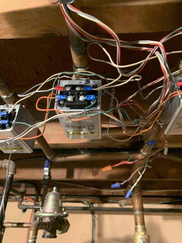 Completed second phase of zone valve repair by replacing two remaining zone valve power heads in customer's hydronic heating system. Installation included proper wiring of the new power heads to the existing control system and verification of proper operation. All work was performed according to manufacturer specifications with no complications.