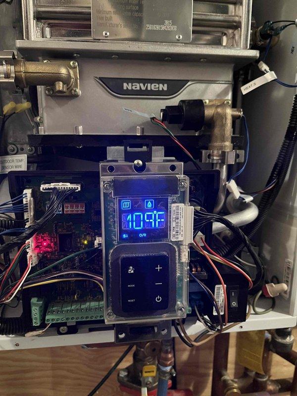 Responded to a callback for a water pressure sensor issue on a Navien unit. Located and replaced the faulty pressure sensor as previously diagnosed and sold by Chris. Verified proper system operation with the new sensor installed, confirming normal water pressure readings of 8.1 psi and temperature regulation at 109°C. System now functioning correctly.