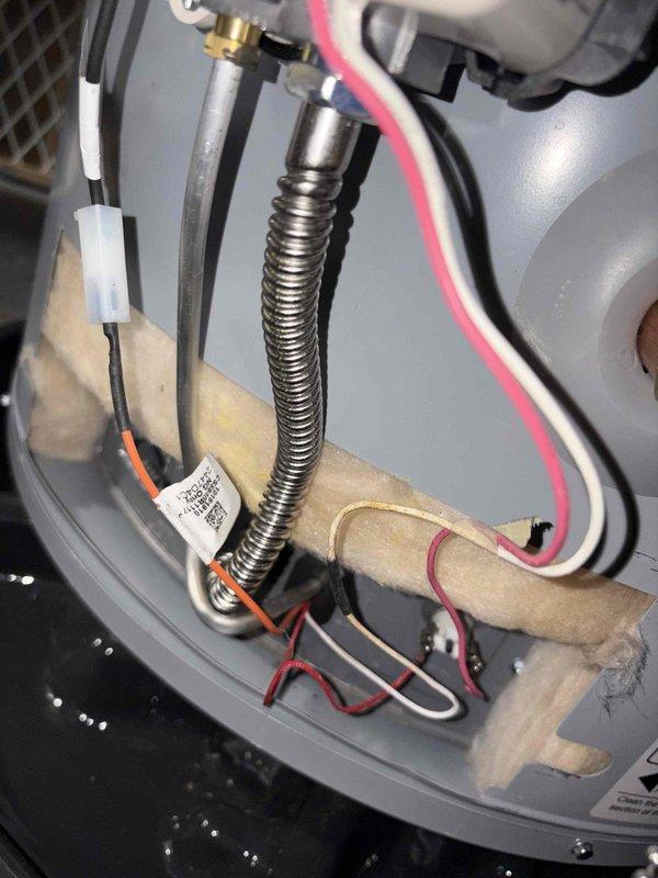 Responded to service call regarding hot water heater thermostat sensitivity issues. Performed temperature diagnostics with digital thermometer, confirming significant temperature fluctuations of approximately 15 degrees. Inspected internal wiring connections and components. Documented issue for follow-up with manufacturer's technical support to determine if temperature range variation is within normal parameters.