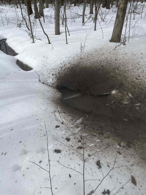 Returned to property to perform line jetting service sold by Chris AZ. Located and accessed cleanout in snow-covered area. Successfully jetted the drain line to clear blockage and restore proper flow. Confirmed system functioning correctly after service completion.