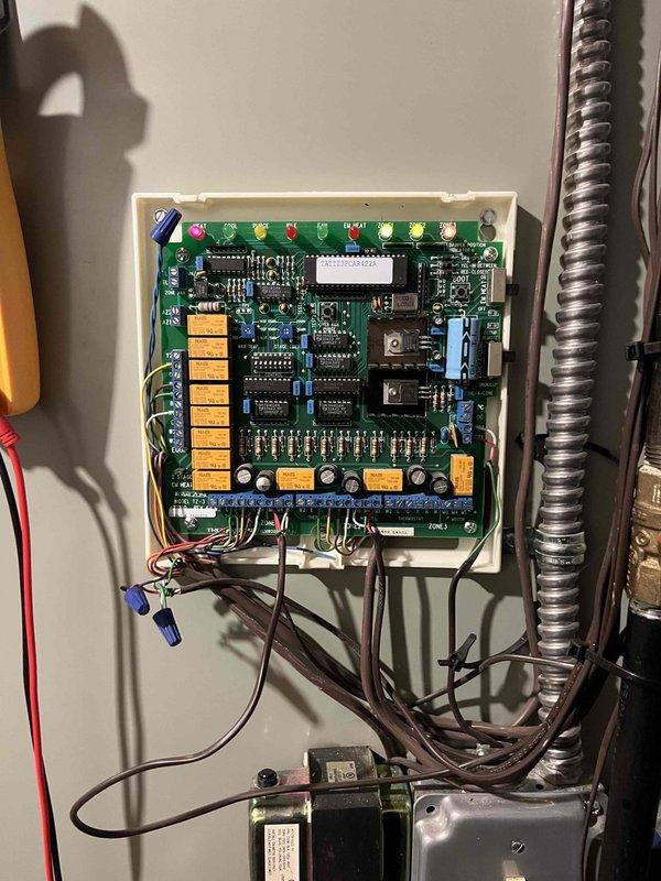 Completed zone damper replacement service by installing new 8x20 electric damper that was previously sold and available from inventory. Inspected existing HVAC system components, removed worn damper assembly showing signs of dust accumulation and metal deterioration, and verified proper operation of newly installed damper with the system control board.