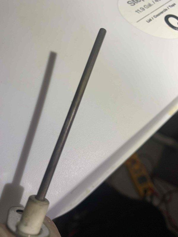 Responded to no-heat call where furnace was inoperative and home temperature had dropped to 60 degrees. Diagnostic testing revealed a faulty flame sensor with visible corrosion. Cleaned and reinstalled flame sensor, restoring proper flame detection and returning system to normal operation.