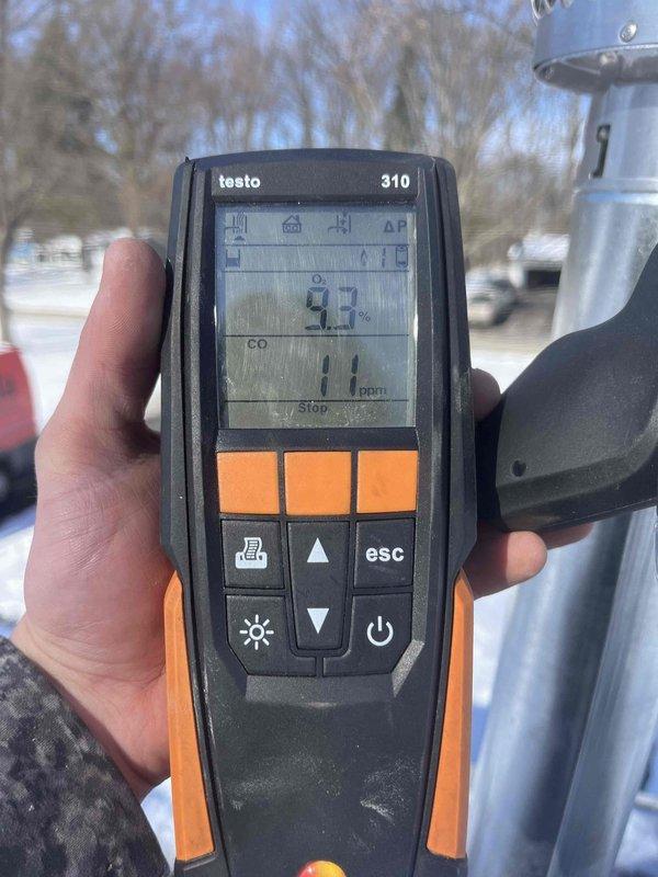 Installed garage heater as follow-up to previous sale. Identified and corrected improper Kdzgas line installation. Combustion analysis performed with Testo 310 showing acceptable parameters - final readings of CO at 11ppm, CO₂ at 6.6%, and O₂ at 4.3%. Coordinated with roofer for proper venting completion.