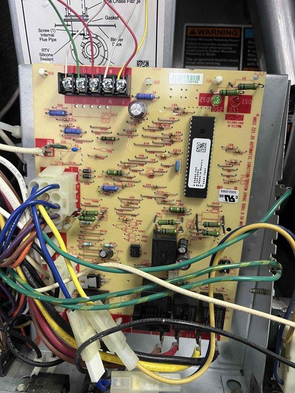 Performed comprehensive tune-up on older Carrier air handler that was producing whistling noise. Conducted static pressure testing with dual port manometer, confirming readings of 3.59 on both ports. Inspected control board and wiring connections, verifying all components were properly secured and functioning correctly.