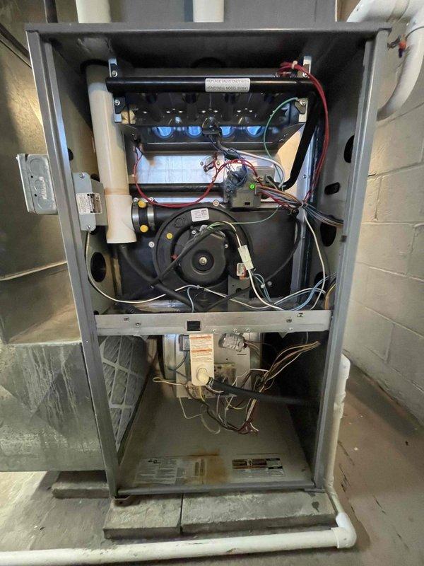 Returned to complete previously sold repair by replacing blower wheel in customer's furnace. Accessed interior components by removing front panel, installed new blower wheel assembly within the air handler section, and verified proper operation of the system after installation.