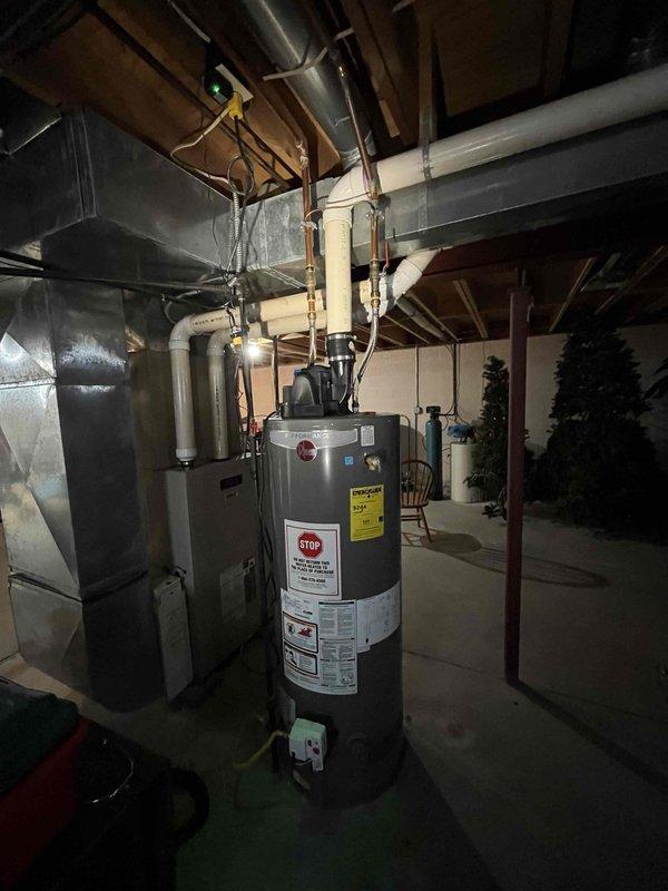 Responded to callback regarding knocking noise in shower after previous service. Inspected plumbing system and discovered expansion tank (Flexcon WR120R) needed adjustment. Secured loose pipe brackets in wall cavity that were causing water hammer effect during temperature changes. Problem resolved with no further remediation needed.
