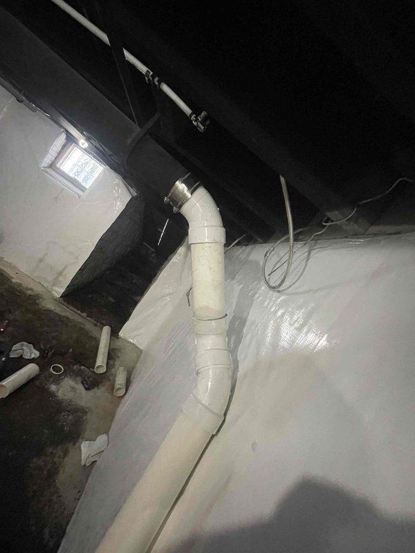 Diagnosed and cleared ventilation issue in drainage system causing toilet gurgling and slow bathroom sink drainage. Inspected PVC stack and waste line connections, identifying partial blockage in main drain line. Performed hydro-jetting to remove accumulated debris and restore proper drainage and ventilation throughout the plumbing system.