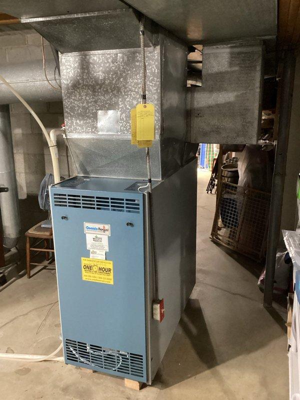 Conducted site assessment for potential installation of Aprilaire humidifier system. Inspected existing HVAC infrastructure including blue furnace unit with attached galvanized ductwork and water heater with PVC pipe connections. Documented current setup with photos to develop appropriate humidification solution for the residence.