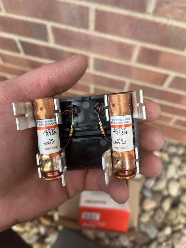 Returned to complete mini-split installation. Verified electrical connections at the meter base including proper circuit breaker installation with line and load terminals. Installed and tested 15A 250V AC fuses in the disconnect. Ensured all components were properly leveled and securely mounted per manufacturer specifications.