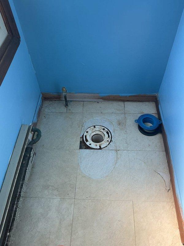 Removed and replaced two toilets - installed one standard model and one ADA height unit. Replaced corroded flange on first toilet and installed new wax ring to ensure proper seal. Both units successfully tested for proper function and leak-free operation.